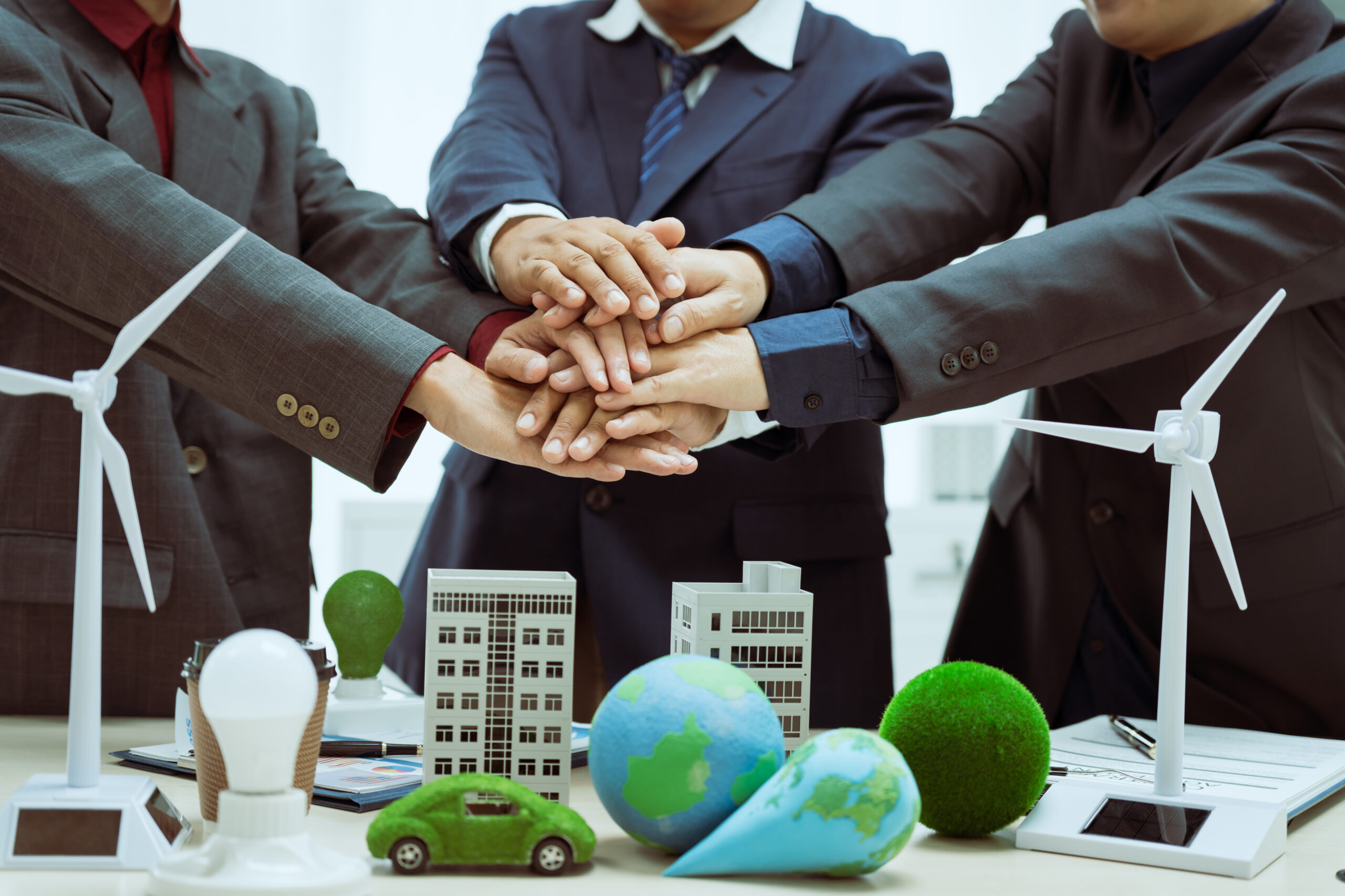 three businessmen meet table to discuss the devel 2025 02 15 10 54 37 utc scaled