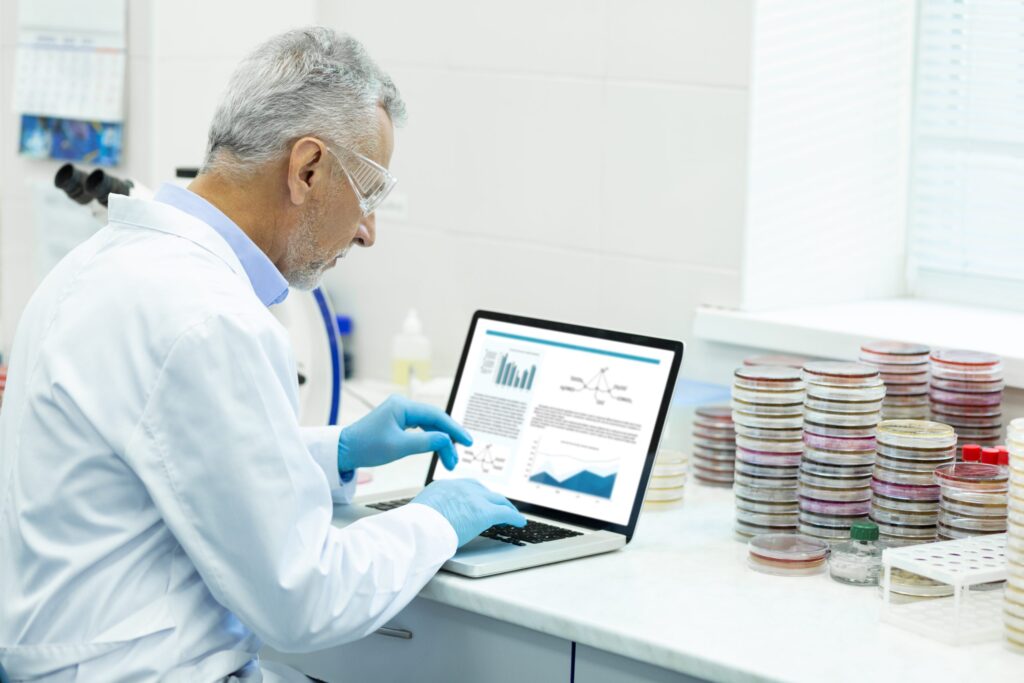serious mature scientist typing article on his lap 2025 03 09 06 20 12 utc scaled 1